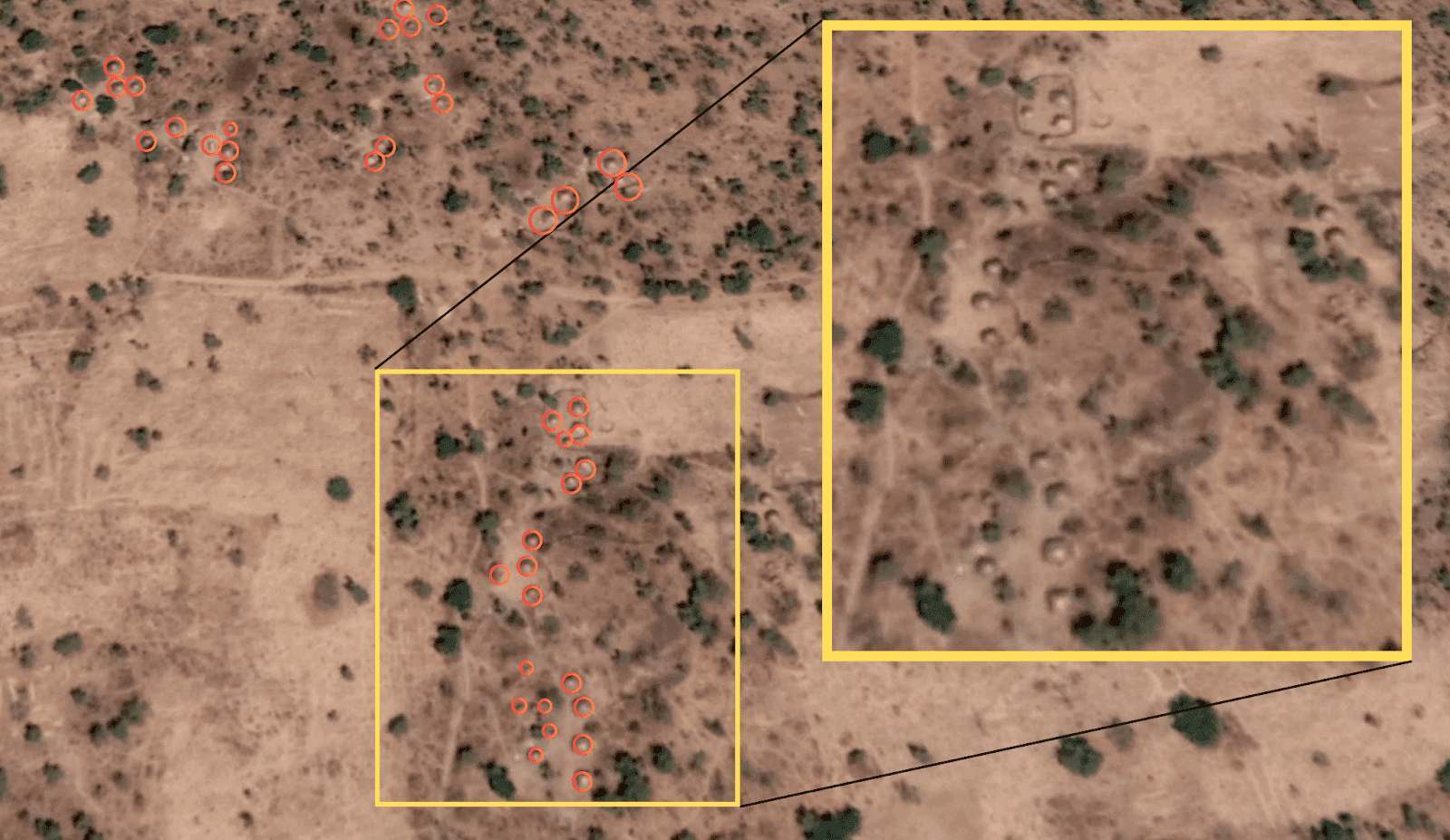 Aerial view of a landscape with marked areas in a zoomed-in section, highlighting specific points of interest.