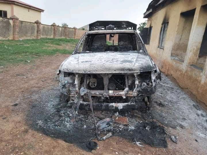 Police vehicle engulfed by fire set up by the armed terrorists at the Police Division in Zugu, Zamfara State.