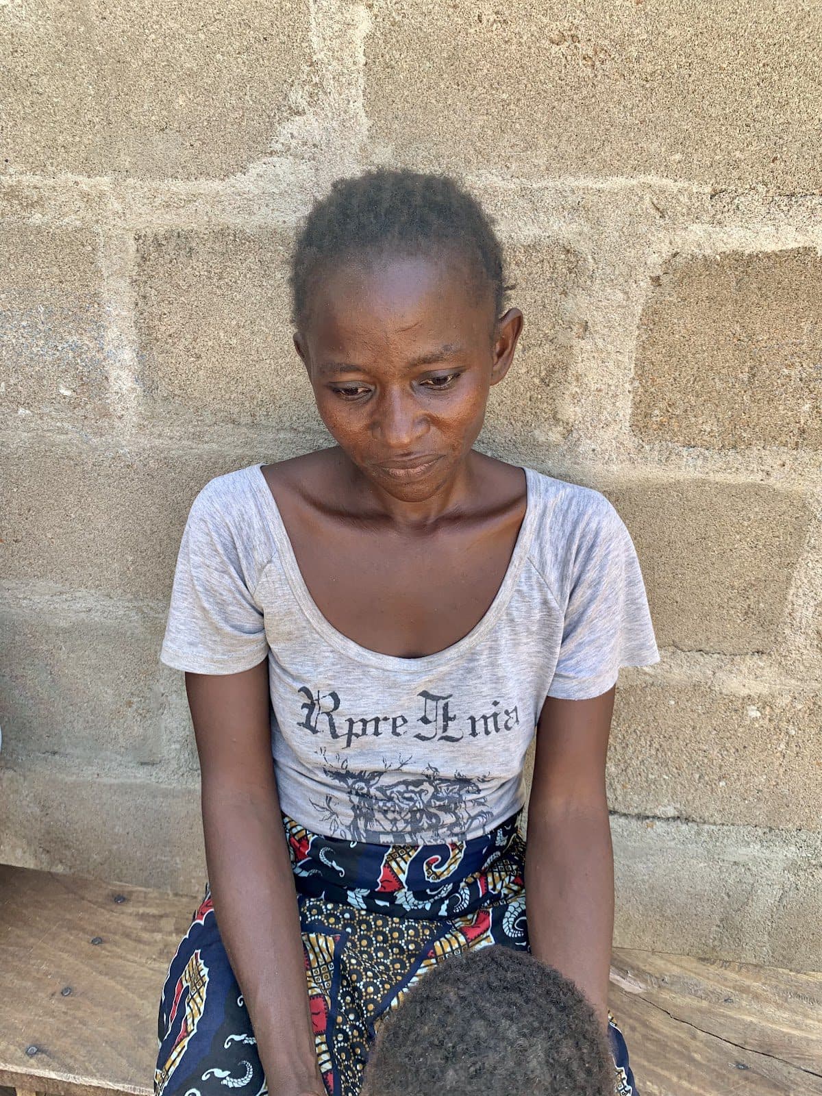 Janet Mfanyi looks distraught as she narrates the incident that led to the loss of her child. Photo: Chigozie Victor/HumAngle.
