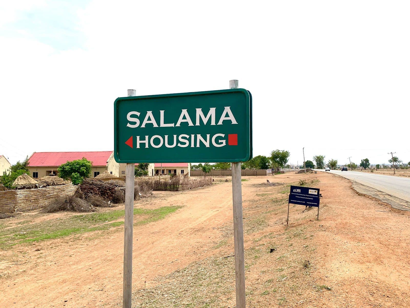 Signpost leading to the housing estate built for the IDPs at Sangere-Margi in Girei. Photo: Saduwo Banyawa/Humangle.