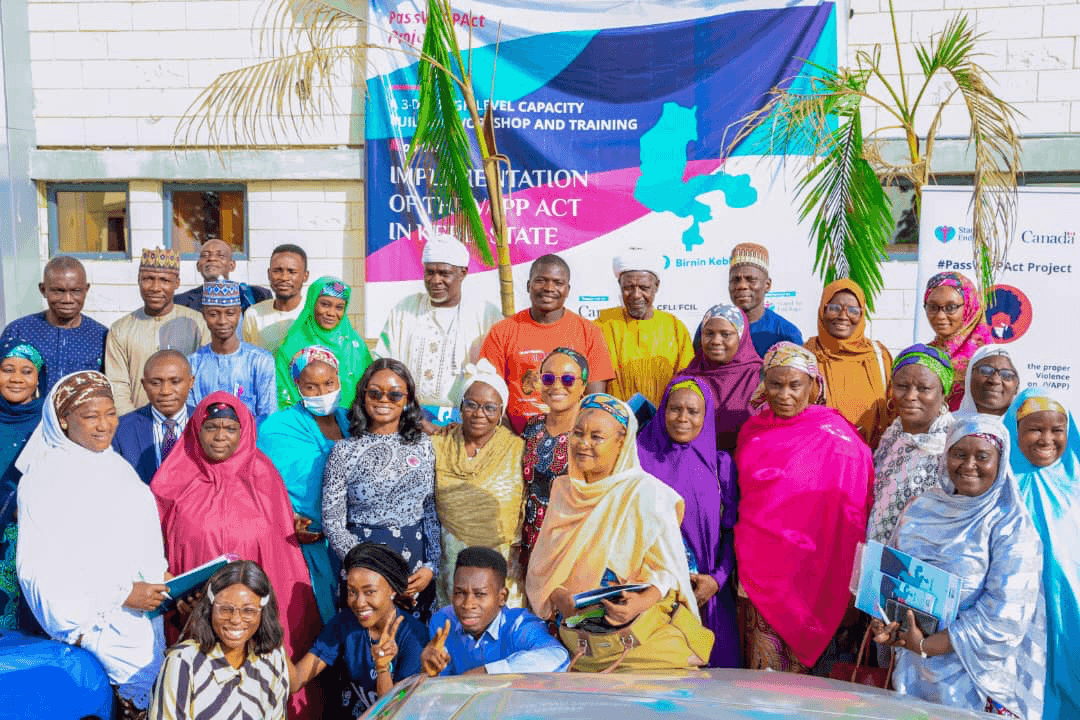 A group of people posing for the #PassVappActKebbi.