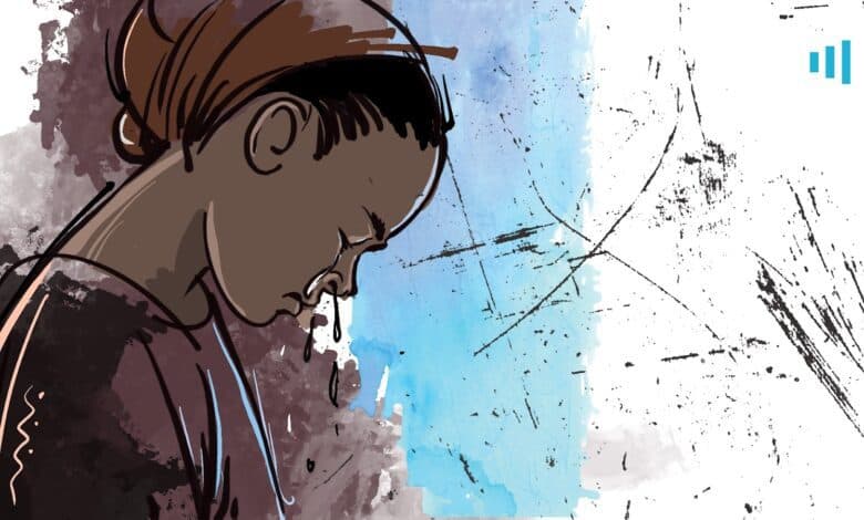 Illustration of a person in profile looking down, with a somber expression, against a textured background of mixed colors.