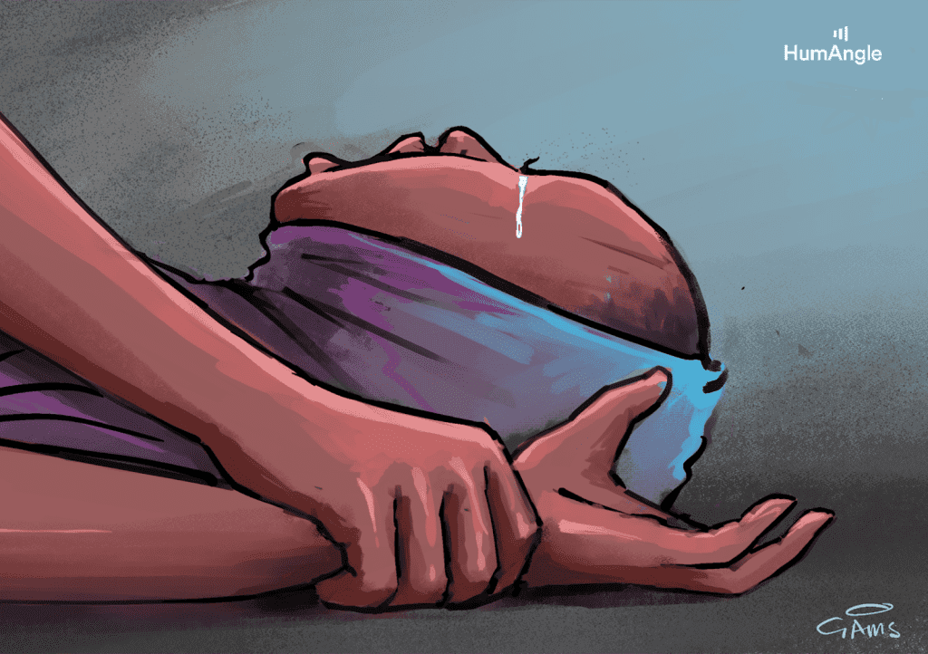 Tearful person with head wrapped in cloth, hands held suggestively.