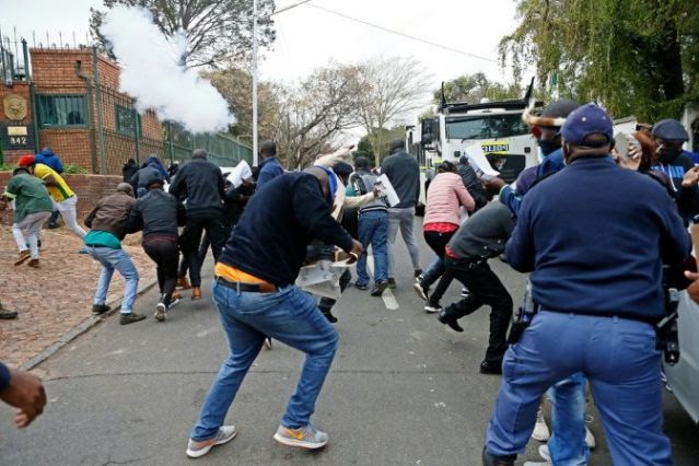 Protesters And South African Police Clash At Zimbabwe Embassy