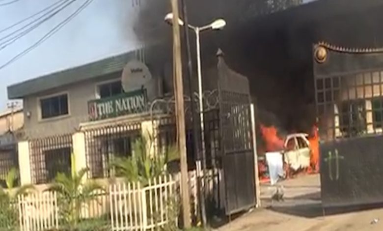 Armed Men Invade The Nation Lagos Office, Burn Cars, Loot Items