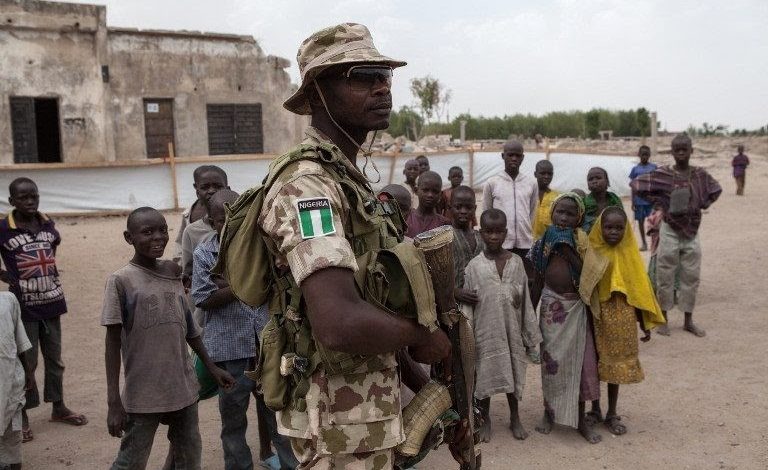 A Nigerian soldier patrols in northeastern Nigeria. File: AFP/Florian Plaucheur