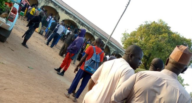 Parents and sympathisers flooded the Kagara school gate after the attack on February 17, 2021. Photo: Channels TV