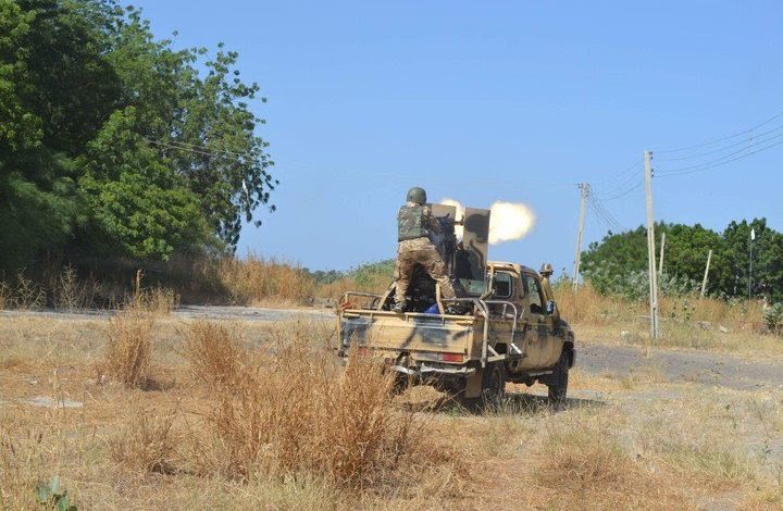 Nigerian army gun truck opening fire.