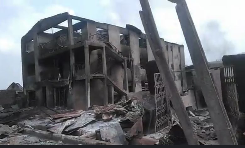 Photo: A screenshot from live video of the razed buildings. Credit: BBC Pidgin.