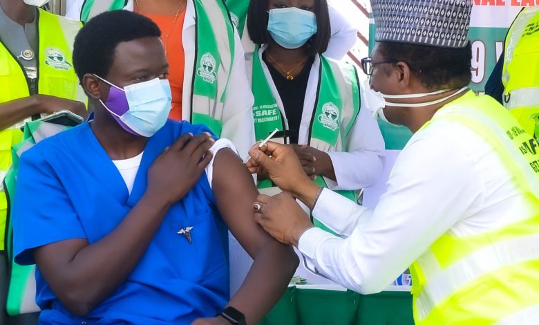 Doctor Ngong Cyprian getting a shot of the AstraZeneca vaccine. Photo: Ministry of Health/Twitter.