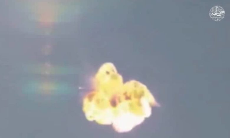 A ball of explosion covers a Nigerian Air Force Alpha Jet. Screenshot from a propaganda video released April 4, 2021