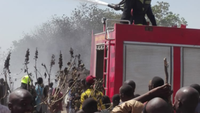 Firefighters putting off the inferno at Muna Elbadawi IDP Camp on Sunday