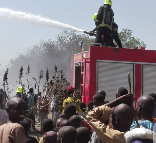 Firefighters putting off the inferno at Muna Elbadawi IDP Camp on Sunday