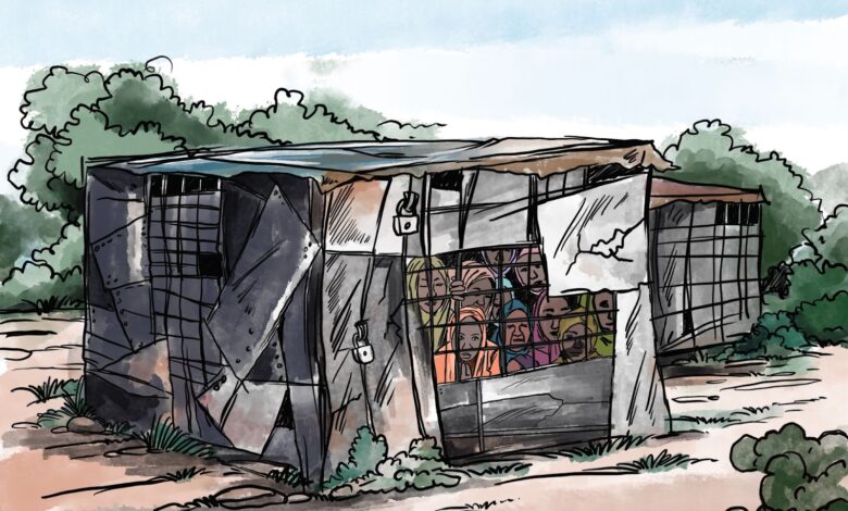 The picture is of a shack made of scrap metal, a group of women peer out from inside