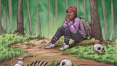 A Cameroonian migrant, lost in the forest of the Darien Gap in Panama, sits down and cries