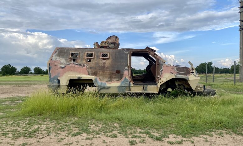 A Nigerian army armoured vehicle burnt at the entrance of Kirawa community.