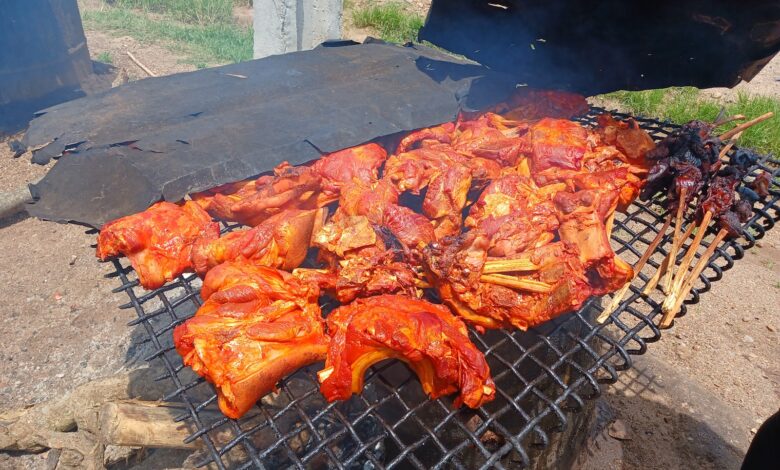 The roasting of grasscutters at Asejire bushmeat market in Osun State.