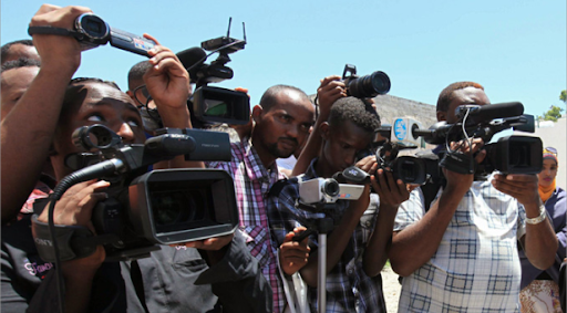 A group of Nigerian journalists covering an event.