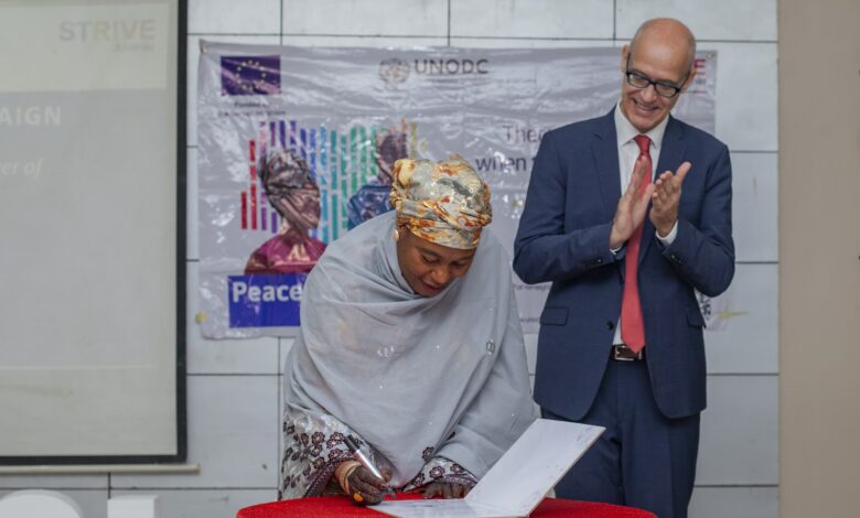 Commissioner Borno State Ministry of Women Affairs and Social Development signed Community Dialogue Structures during the Handing ceremony.