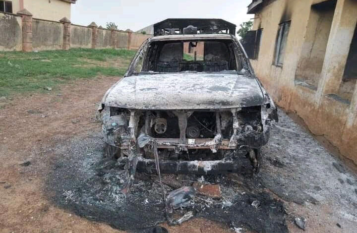 Police vehicle engulfed by fire set up by the armed terrorists at the Police Division in Zugu, Zamfara State.