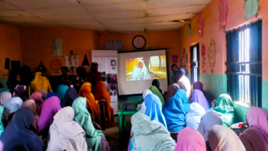 Over 50 women in Malali gathered in a classroom to watch a documentary on women who could not have an education. Photo: Nathaniel Bivan/HumAngle.