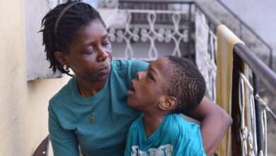 Modupe Famodun, 40, and her eight-year-old son, Tiolu, who lives with cerebral palsy. Photo Credit: Samuel Okoro.