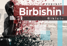 Podcast cover for "Birbishin" featuring artistic splatter and a veiled figure.