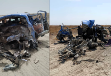 Two images of a severely wrecked blue vehicle in a desert-like environment.