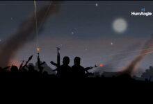 Silhouetted figures with weapons against a twilight sky with light streaks and a watermark "HumAngle".