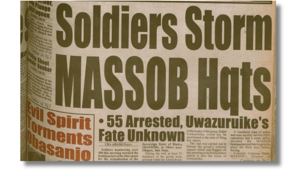 Close-up of a newspaper headline about soldiers storming MASSOB headquarters, with 55 arrested and a leader's fate unknown.