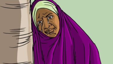 Illustration of an elderly woman in a purple garment with a tear on her cheek, looking concerned or sad.