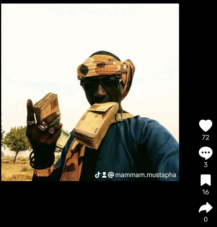 Person in sunglasses and headwrap holding bundles of cash to their face.