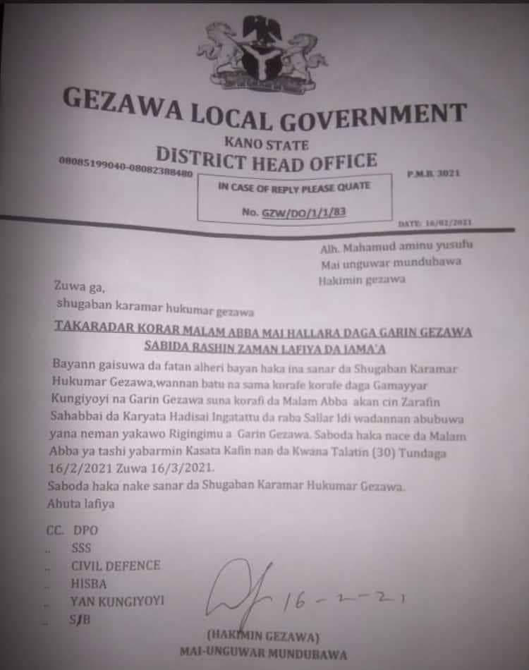 Document from Gezawa Local Government in Kano State, Nigeria, with header, official seal, text, and signature.