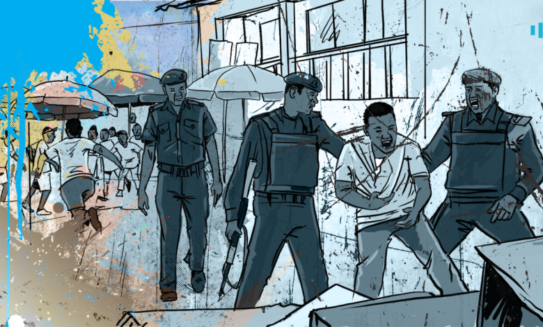 Illustration of two police officers detaining a man against a backdrop of a busy street scene.