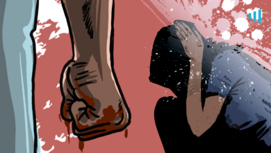 Illustration of a clenched fist covered in blood with a distressed person cowering in the background.