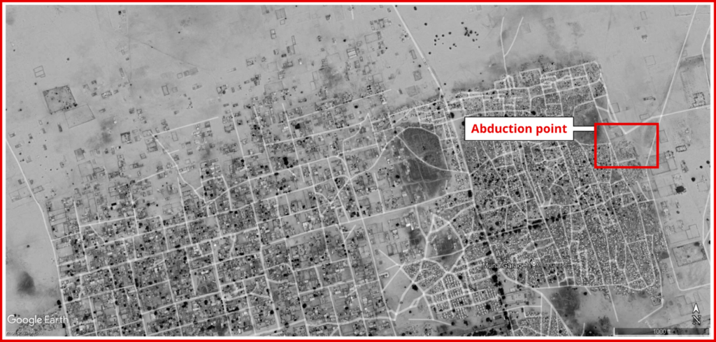 Satellite view of a town with streets, buildings, and a highlighted "Abduction point."