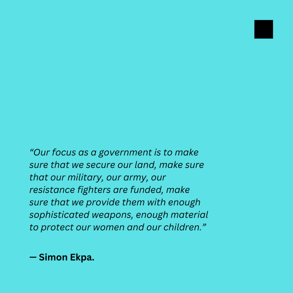 Quote on military funding and protection by Simon Ekpa on a blue background with a black square in top right corner.