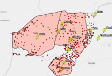 Map with highlighted areas and pins, likely displaying specific locations or data points in a geographical region.