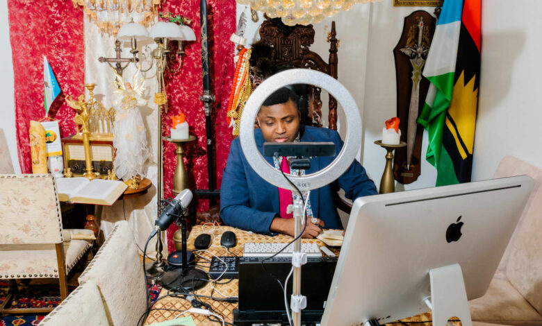 Person podcasting in a richly decorated room with eclectic decor and a ring light.