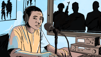 Illustration of a radio host speaking into a microphone, while three armed figures stand outside the studio window.