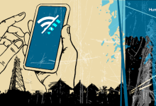 Hands holding a smartphone with a weak signal icon, against a backdrop of communication towers and silhouetted buildings.