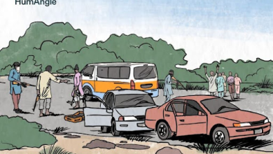 Illustration of an armed group stopping cars on a rural road, with a bus and two cars and people standing nearby.