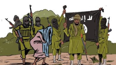 A group of armed, masked individuals stands in a wooded area with a flag featuring Arabic script.