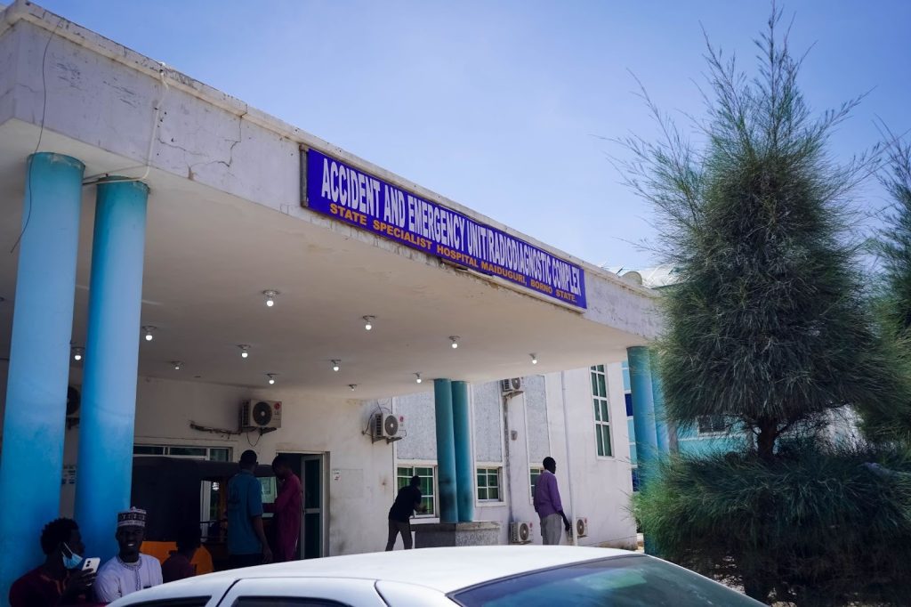 Entrance of State Specialist Hospital in Maiduguri, Borno State, with a sign for the Accident and Emergency Unit.