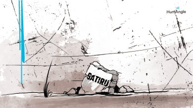 Abstract art with a cracked stone labeled "SATIRU" amidst scribbled lines and smudges, featuring a small blue streak.